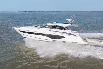 2018 Princess V50 yacht cruising on open water, showcasing sleek design and performance.