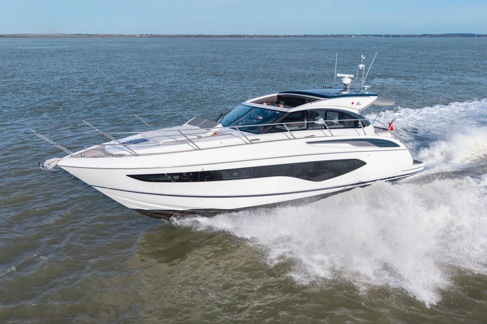 2018 Princess V50 yacht cruising on open water, showcasing sleek design and luxury.