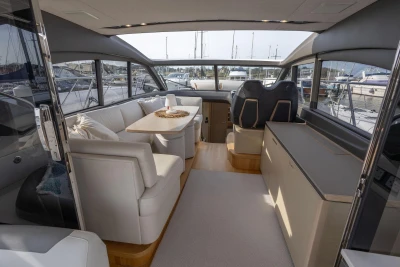 Luxurious interior of 2018 Princess V50 yacht with elegant seating and modern design.