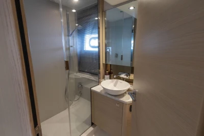 Luxurious bathroom in 2018 Princess V50 yacht with modern fixtures and elegant design.