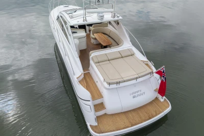 2006 Princess V48 yacht with spacious deck and seating, named 