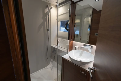 Luxurious bathroom in 2026 Princess V50 yacht with modern fixtures and elegant design.