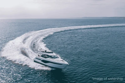 2024 Princess F50 yacht cruising on open sea, creating a dynamic water trail.