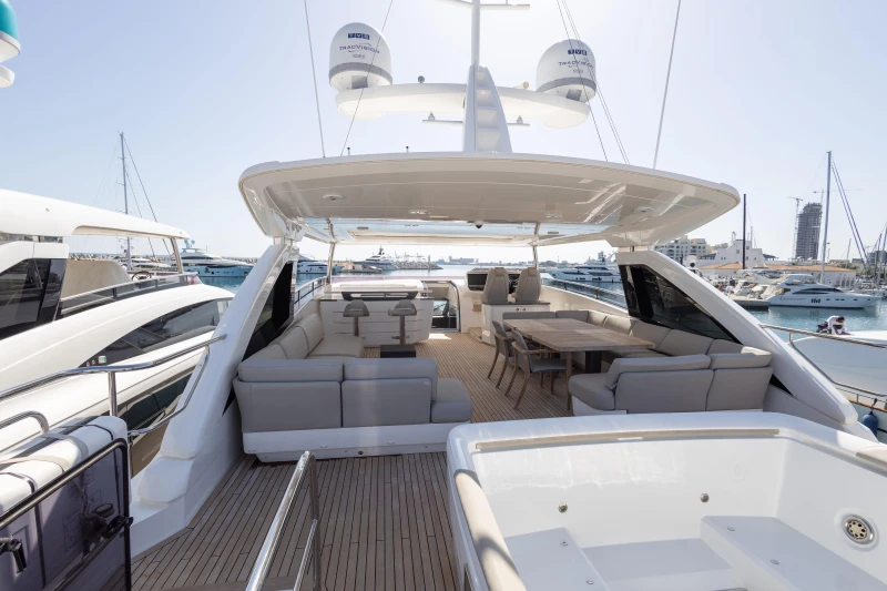 Luxurious 2019 Princess 30M yacht with spacious deck and modern seating area.