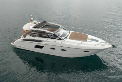 2014 Princess V39 yacht on calm water, showcasing sleek design and luxury features.
