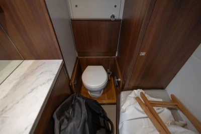 Luxurious 2017 Princess 52 yacht bathroom with wooden accents and modern amenities.