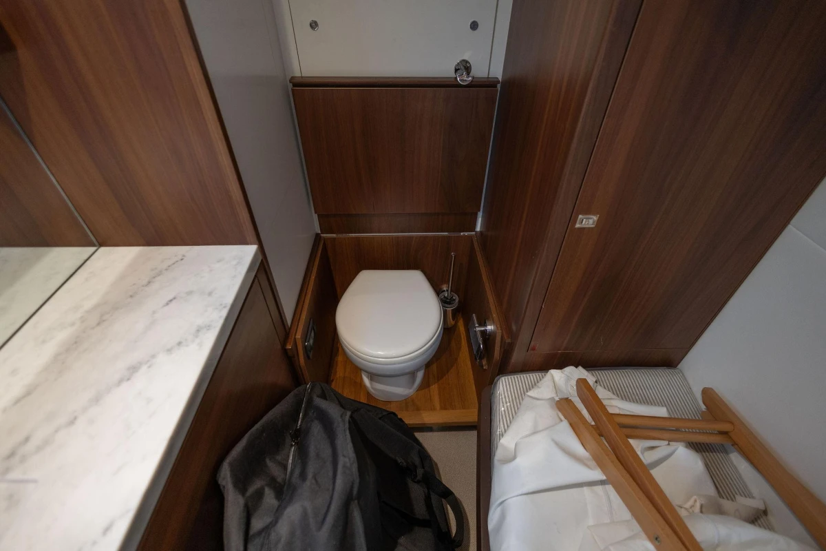 Luxurious 2017 Princess 52 yacht bathroom with wooden accents and modern amenities.