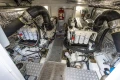 Engine room of a 2017 Princess 52 yacht, featuring dual engines and metallic insulation.