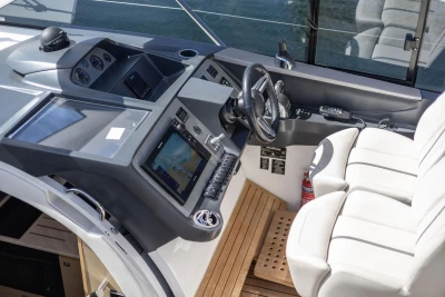 Cockpit of 2017 Princess V40 yacht with modern controls and white seating.