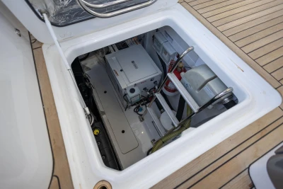 Engine compartment of a 2017 Princess V40 yacht, featuring equipment and storage.
