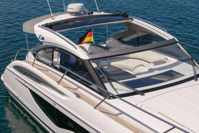 2017 Princess V40 yacht with sleek design, cruising on clear blue water.