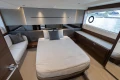 Luxurious interior of 2025 Princess V50 yacht with elegant bedroom design.