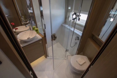 Luxurious bathroom in 2016 Princess V58 Open yacht with modern fixtures and elegant design.