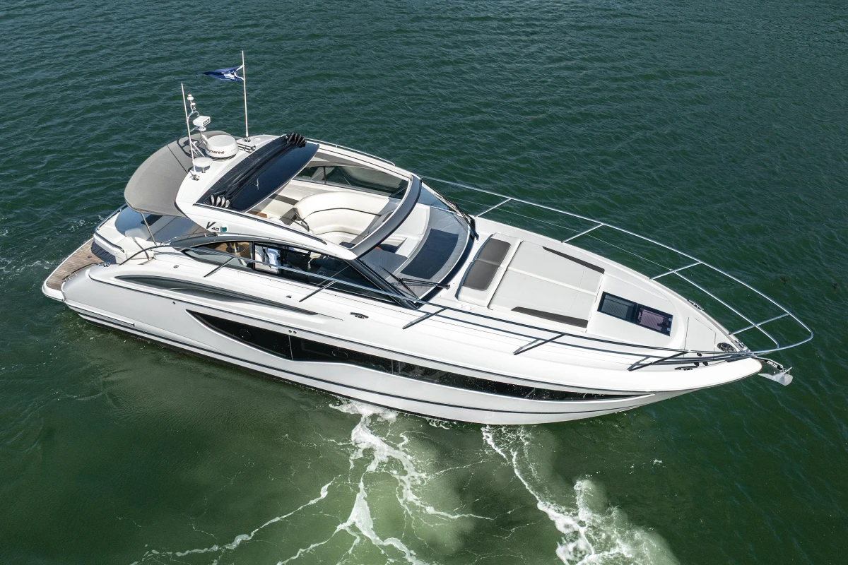 2024 Princess V40 yacht cruising on open water, showcasing sleek design and luxury features.