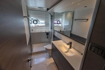 Luxurious bathroom in 2025 Princess S65 yacht with modern fixtures and sleek design.