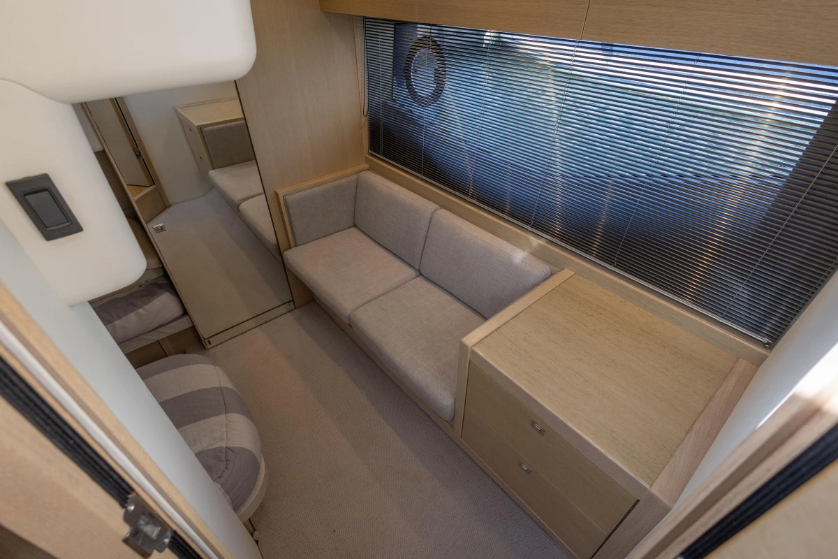 Luxurious interior of 2018 Princess V40 yacht with modern furnishings and ample natural light.