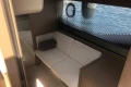 Modern interior of 2022 Princess V40 yacht with cozy seating and sleek design.