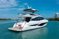 Luxury Princess F65 yacht cruising on clear blue waters, 2025 model.