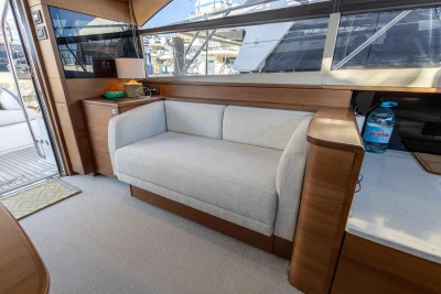 Luxurious interior of 2018 Princess 43 yacht with elegant seating and modern design.