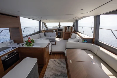 Luxurious interior of 2025 Princess F65 yacht with modern furnishings and ocean view.