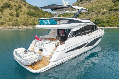 Luxurious 2025 Princess F65 yacht on serene waters, featuring sleek design and modern amenities.