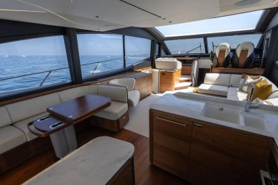 Luxurious interior of 2023 Princess S72 yacht with modern furnishings and ocean view.