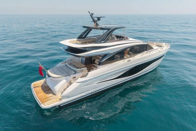 Luxurious 2023 Princess S72 yacht cruising on open sea, showcasing sleek design and elegance.