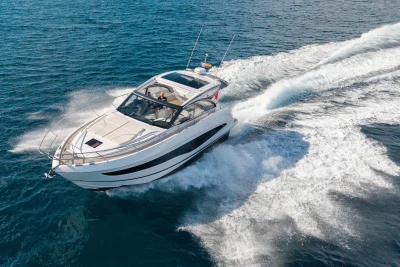 2024 Princess V50 Open yacht cruising on open water, showcasing sleek design and performance.