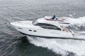 2017 Princess 43 yacht cruising on open water, showcasing sleek design and luxury features.