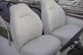 Luxury white leather seats on a 2017 Princess 43 yacht.