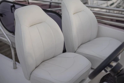 Luxury white leather seats on a 2017 Princess 43 yacht.