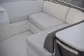 Luxurious seating area on a 2017 Princess 43 yacht, featuring white upholstery.