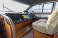 Interior of 2017 Princess 43 yacht cockpit with modern navigation controls and leather seating.