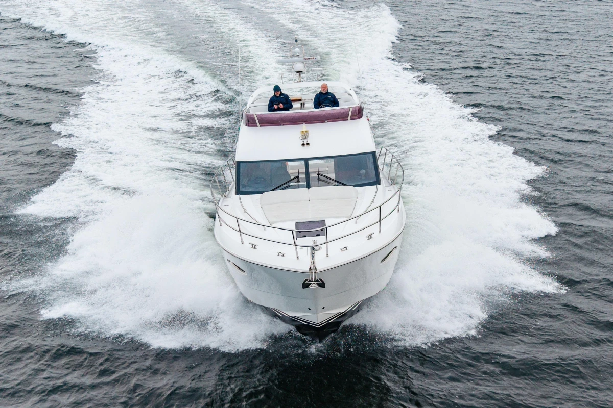 Luxury Princess 43 yacht cruising on open water, 2017 model.