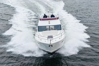 Luxury Princess 43 yacht cruising on open water, 2017 model.