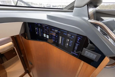 Control panel of a 2018 Princess 49 yacht with digital displays and switches.
