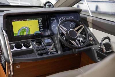 Helm of 2018 Princess 49 yacht with navigation display and controls.