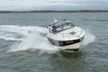 2013 Princess V39 yacht cruising swiftly on open water.