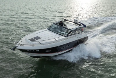 2013 Princess V39 yacht cruising on open water, showcasing sleek design and performance.