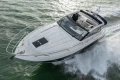 2013 Princess V39 yacht cruising on open water, showcasing sleek design and luxury features.
