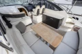 Luxurious 2013 Princess V39 yacht interior with seating and table.