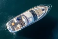 Aerial view of 2017 Princess 49 yacht cruising on calm blue waters.