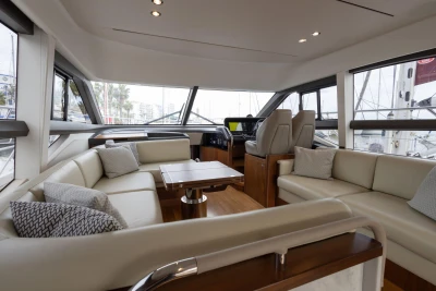 Luxurious interior of 2017 Princess 49 yacht with elegant seating and modern design.