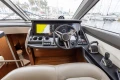 Luxurious 2017 Princess 49 yacht cockpit with advanced navigation controls and leather seating.