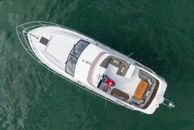 Aerial view of 2016 Princess 43 yacht on calm water.