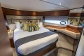 Luxurious 2022 Princess S66 yacht bedroom with elegant decor and modern design.