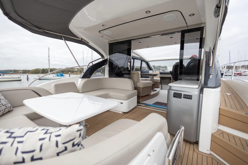Luxurious 2022 Princess V50 yacht interior with elegant seating and modern design.