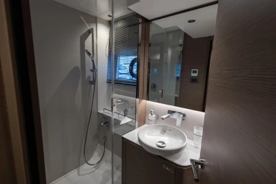 Modern bathroom in 2022 Princess V50 yacht with sleek fixtures and elegant design.