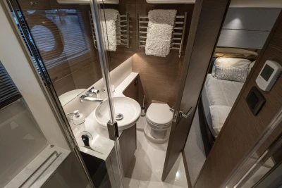 Luxurious bathroom in 2022 Princess V50 yacht with modern fixtures and elegant design.