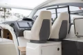 Interior of 2016 Princess V39 yacht with modern helm and dual seats.